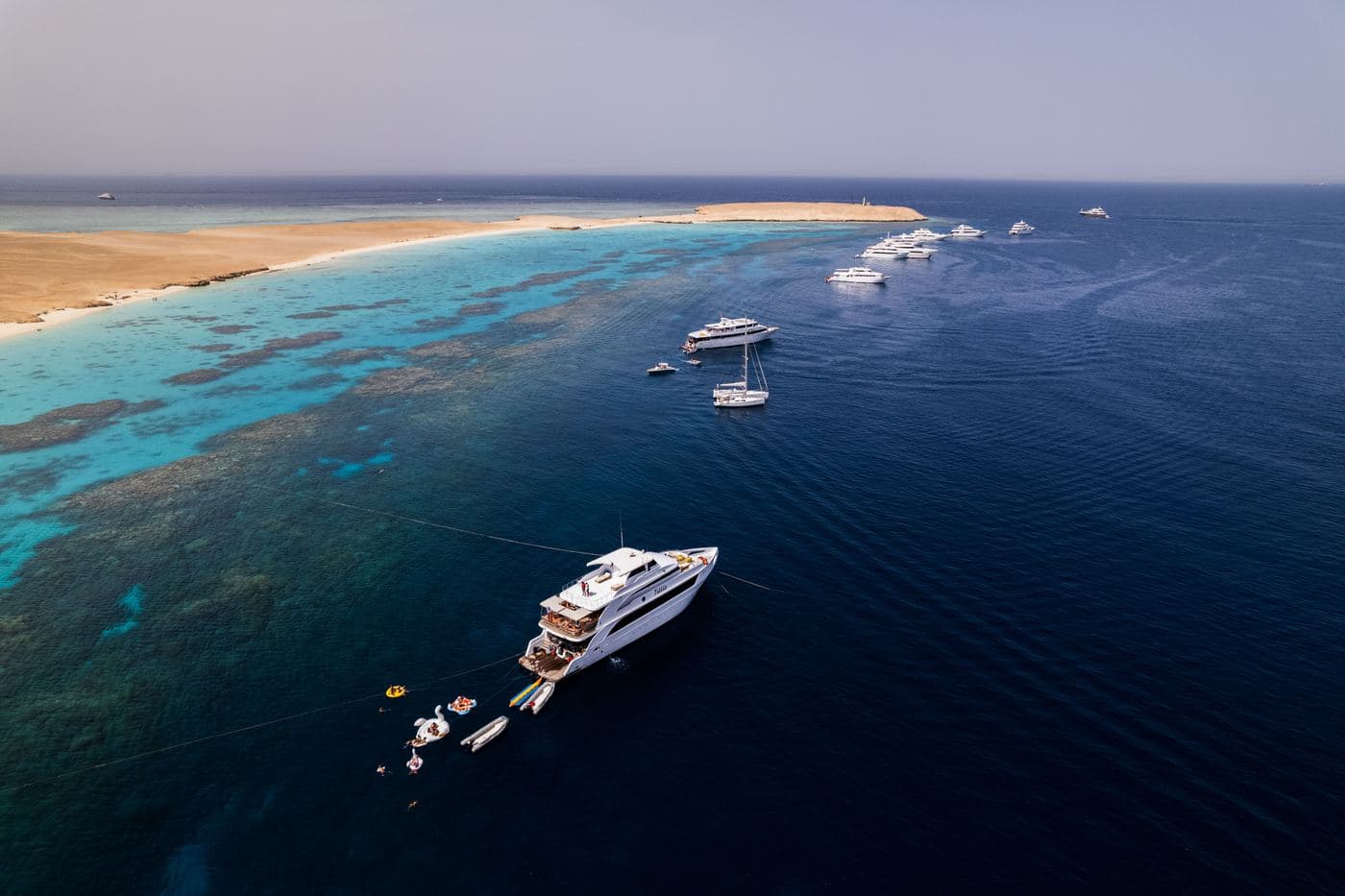 Orange Bay Island — crystal lagoon and white sand beach