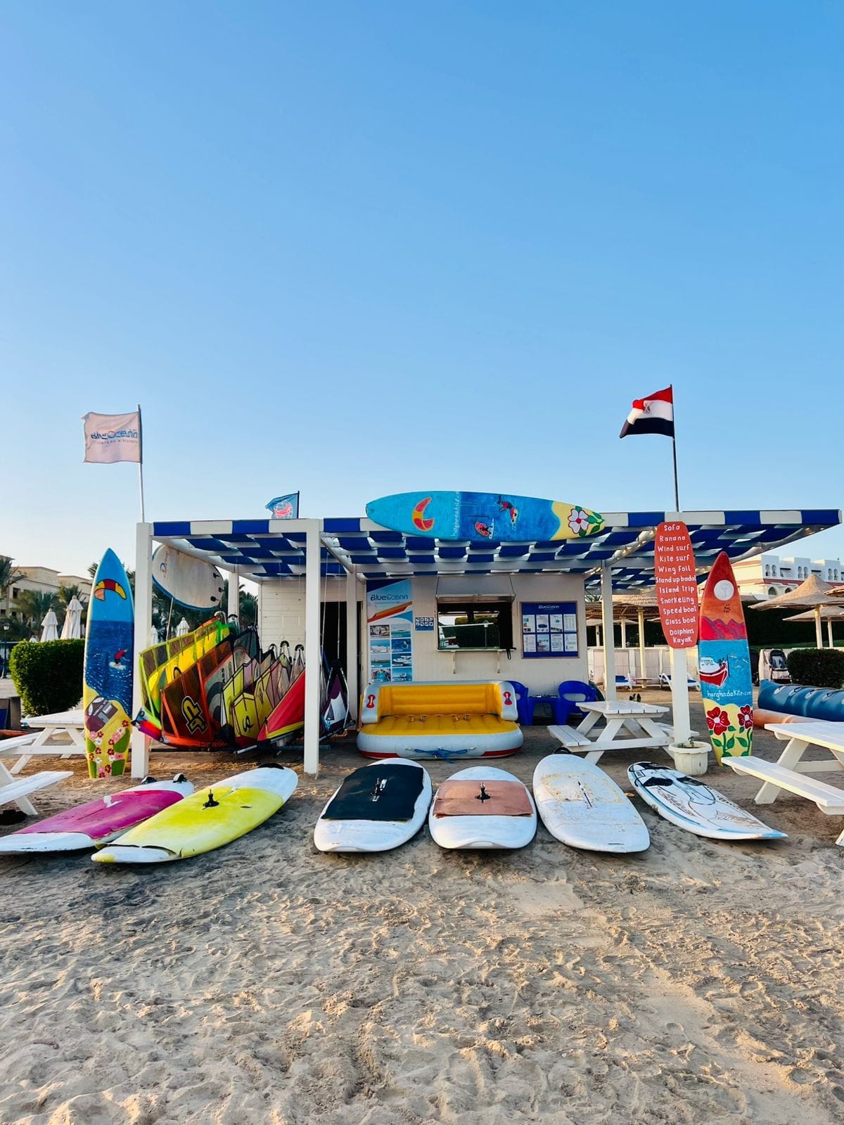 Windsurfing station on Hurghada beach with colorful boards